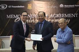 GT Foundation and Metrobank Foundation donate to Dr. Placido L. Mapa, Jr.  Scholarship Endowment