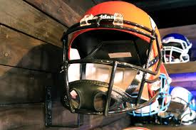 Here is a video to show you how to install your visor on your american football helmet. Football Helmet Hanger Green Gridiron Inc