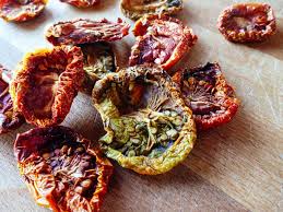 Variations in the amounts of flesh, juice and gel in different types of tomatoes affect how they are best preserved. How To Make Sun Dried Tomatoes Fast In The Oven Garden Betty