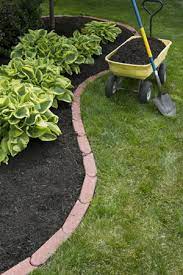Should you put down mulch every year? How To Mulch Your Yard In 5 Easy Steps
