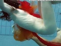 Cute lucie is stripping underwater. Imzog Com