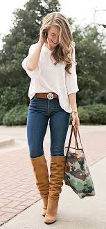 Black Boots With Blue Jeans Womens Fall Outfits Women S White Elbow Sleeved Top Blue Denim Jeans And Brown Boots Outfit Womens Fashion Jeans Fashion Brown Boots Outfit