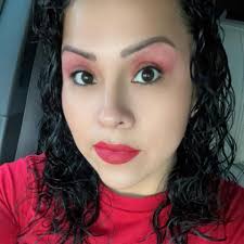 Who is the man in the baby blue truck picking up metal in town?