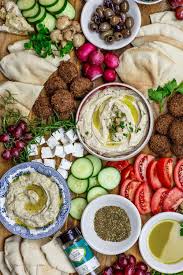 Mediterranean Diet Breakfast Board With Falafel Hummus Black Olives Feta Cheese And Mediterranean Breakfast Mediterranean Recipes Mediterranean Diet Recipes