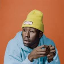 He has a way of owning a red carpet look consisting of a bucket hat, sweater vest. Tyler The Creator Clothes Outfits Brands Style And Looks Spotern