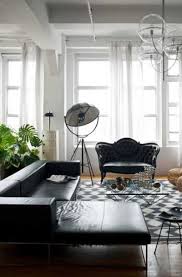 The original idea for the living room is the use of embossed black wallpaper and velvet upholstery of chairs with the same pattern. 17 Black Living Room Decor Ideas Sebring Build Design