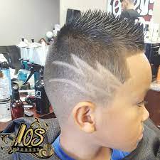 The design begins on the side of your head and makes its way to the back for a final style that looks breathtaking from every angle. Kids Lightning Bolt Design Cut Custom Fadez Barbershop Facebook