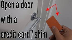 How to open a tilt the card so the side that's closest to you is almost or is touching the doorknob. How To Open A Door With A Credit Card Shims Life Hack Youtube
