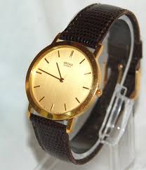 Choose from a large selection of quality replacement watch straps all at affordable wholesale pricing. Gent S Seiko Gold Tone Quartz Watch 5y94 8000 Brown Lizard Grain Leather Band Seiko Gold Quartz Watch Leather Band