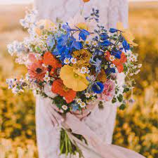 Red carnation flowers are suggestive of an aching heart and strong approbation. The Symbolism And Meaning Behind Your Wedding Flowers