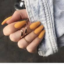 Here's a simple nail art tutorial for ethnic nail art design hunger games inspired ! Cute Orange Nails And Gold Rings