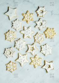 Tools to use these tools make decorating easier: Fancy Winter Sugar Cookies Decorated With Royal Icing And Sprinkles On A White Marble Surface Stock Photo Offset