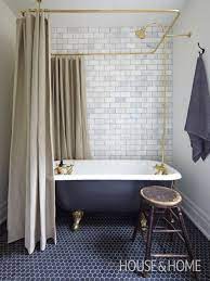 The pink marbled tile flooring compliments this bold red bath making it more striking to the eye. Inspired By Clawfoot Tubs The Inspired Room