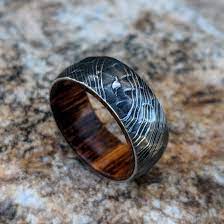Mens Wedding Band Damascus Steel Ring With Ironwood Sleeve In 2020 Damascus Steel Wedding Band Steel Wedding Bands Damascus Steel Ring