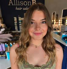 Just ask for "Warm carmel brunette" Plus 1 row of j tied extensions