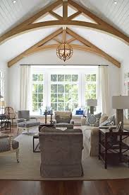 The large chandelier ties the look together with. Image Result For Vaulted Ceiling Ceiling Beams Living Room Vaulted Ceiling Living Room Beams Living Room