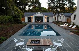 Maybe you would like to learn more about one of these? Modern Farmhouse Backyard Pool Modern Pools Pool Patio Pool Houses