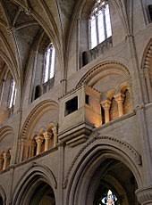 Light pours down at the ceremonial end from an unseen clerestory set into the roof where it steps up to offer nobility. Clerestory Wikipedia