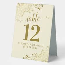 Elegant Gold Frills On Cream Wedding Table Number Table Tent Sign Zazzle Com In 2020 Wedding Table Numbers Wedding Table Cream Wedding