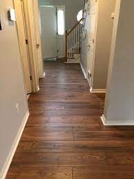 Pergo Timbercraft Wetprotect Valley Grove Oak 12 Mm Thick Waterproof Wood Plank 7 48 In W X 54 33 In L Laminate Flooring 16 93 Sq Ft Lowes Com Waterproof Laminate Flooring Waterproof Vinyl Plank Flooring House Flooring