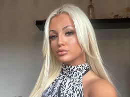 Teen mortified as boyfriend dumps her by text weeks after she had his  initial tattooed