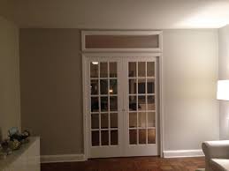 Custom Temporary Wall System With Double French Doors And Borrowed Light Window We Recently Installed In Nyc Apart Nyc Apartment Transom Windows Office Remodel