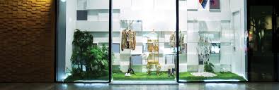 Glass cabinet with frameless design this retail showcase, glass cabinet features a frameless glass design with a black melamine storage. In Store Display Ideas For Your Retail Space Iskalo Development Corp