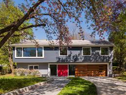 The two story house deliberately presents to the street looking like a single level house. Midcentury Modern Home In Maryland Updated For New Owners Louis Balodemas Hgtv