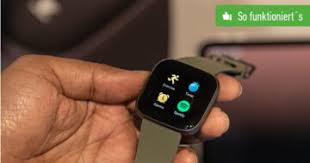 Fitbit Versa Whatsapp Einrichten So Funktioniert S The included usb charging dock attaches to the versa 2 with clips on both sides. fitbit versa whatsapp einrichten so