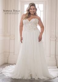 The bodice is shaped like the top of a heart and the classic shape effortlessly compliments the bust. Sophia Tolli Almandine Sophia Tolli Sophia Tolli Wedding Dresses Wedding Dress Shopping Plus Wedding Dresses