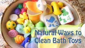 Take a clean sponge and scrub the outside of the toys with the vinegar water. Cleaning Bath Toys The Natural Way Cleaning Bath Toys Bath Toys Baby Bath Toys