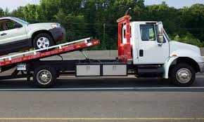 Image result for car on a tow truck