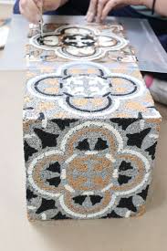 Here's what you'll need to get started… cinder blocks, both regular this project has a twist: Augusta Tile Stencil Cinderblock Planter Patio Wall Cinder Block Garden