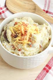 Cheesy mashed potatoes with bacon are comfort food made easy with only 5 ingredients and plenty of cheddar. Slow Cooker Loaded Mashed Potatoes To Simply Inspire