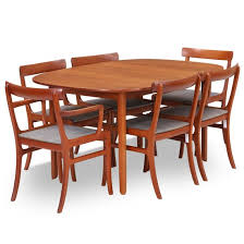 Ideal for kitchens or dining rooms, the solid teak table, with its durable top and contrasting paint finish, will easily accommodate six for dinner. Lot Art Ole Wanscher Rungstedlund Teak Dining Room Suite Consisting Of Dining Table With Two Extension Leaves And Six Chairs Of Which Two Armchairs 9