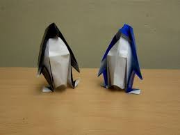 Finally pull the top point forward to do that hold the back of the neck and then you can grab the tip of the beak then pull and open up the penguin. How To Make A Paper Penguin Easy Tutorials Youtube