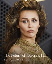 Miley Cyrus channeled her godmother, Dolly Parton, with sky-high waves at  the Grammy Awards this month. Big hair is back. Read more:  https://nyti.ms/4bYGMEi