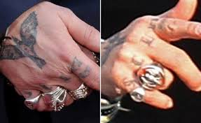 Depp inked his arm in amber last year, shortly after they married. Johnny Depp Gets His Amber Heard Tattoos Altered
