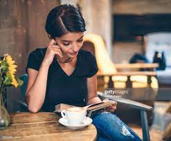 Girl Drinking Coffee And Reading Book In Cafe In 2021 Coffee Girl Coffee Drinks Branding Photoshoot Inspiration