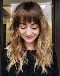 Go for some dramatic long bangs for your next look. Bangin Blonde Brunette Brown Hair With Blonde Highlights Blonde Highlights Brown Blonde Hair