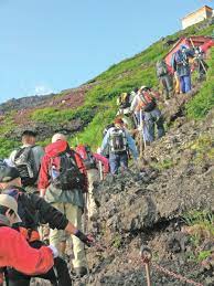 With Japan S Volcanic Activity Rising Mount Fuji Climbers Urged To Wear Helmets News Stripes