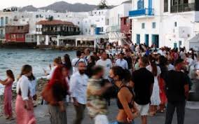Mykonos is feared to be the epicentre of a greek coronavirus spike, with a team of health officials rushing to the resort today. News Ekathimerini Com