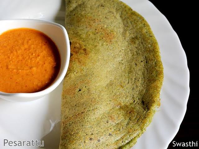 Freshly prepared green gram Pesarattu, AI generated