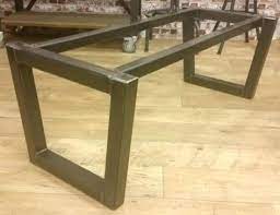 A glass table top over a graceful brown y, braced with white. New Diy Table Base For Glass Top Ideas Steel Table Base Glass Top Table Metal Table
