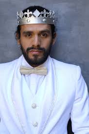 Exotic King with White Outfit and Silver Jewelry Stock Image