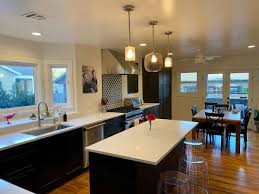 If you are looking for a nice color to pair with white cabinets, you can certainly choose white countertops. An Ikea Kitchen Island Design Gave A Big Boost To Her Kitchen