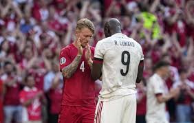 Kevin de bruyne takes the acclaim of his team after firing in belgium's winner against denmark on an emotional day in copenhagen. K5r2k5cu9 Q75m