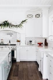 Dark Wood Look Tile With White Cabinets Counter Tops White Kitchen Traditional Classic White Kitchen Kitchen Flooring