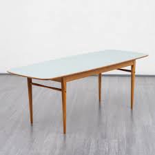 She has been painted in old white on her legs and hand buffed on top to restore natural wood. Vintage 1950s Coffee Table With Formica Top 151926