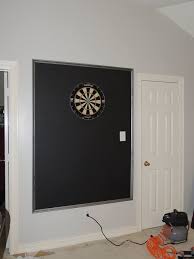 We Took A Sheet Of Mdf Primed It And Painted It With Chalkboard Paint To Put Behind Our Dart Board This Game Room Basement Dart Board Wall Finishing Basement